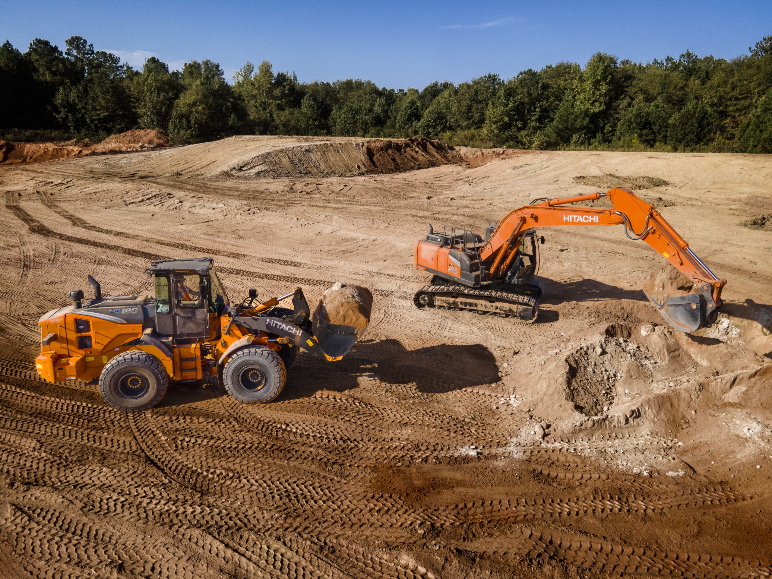 ZAXIS excavator and wheel loader on a job site